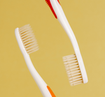 2 Adult Manual Toothbrushes and 2 Travel Toothbrushes